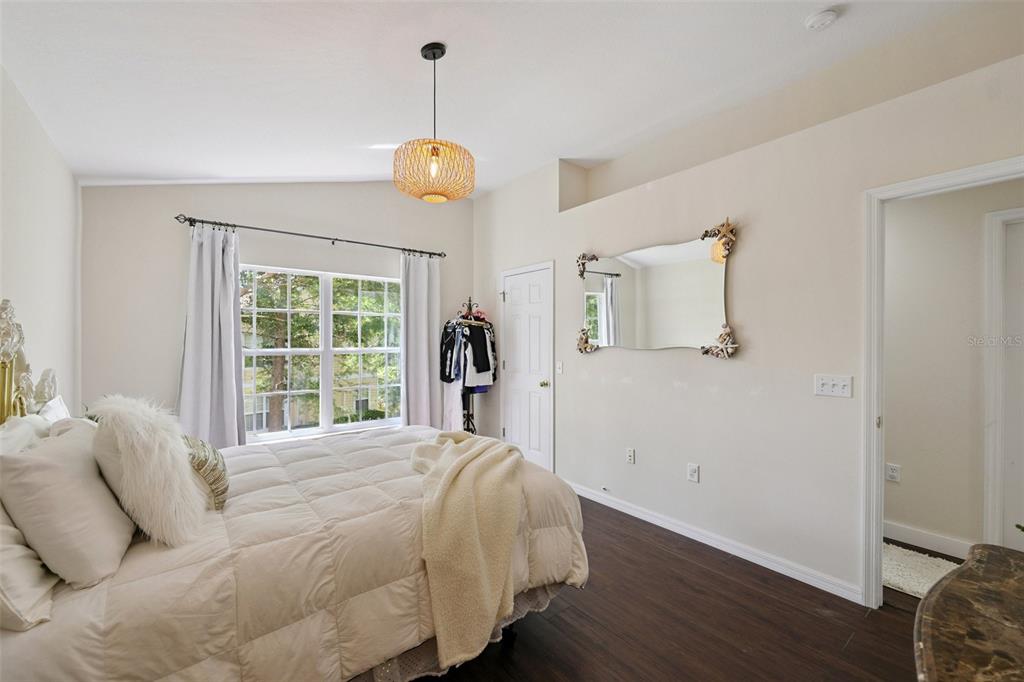 6412 Rosefinch Court, Unit 204 Lakewood Ranch, FL 34202 - Photo 17 of 33 a bedroom with a bed and a window