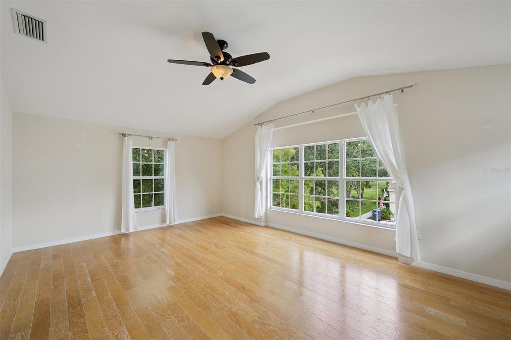 6412 Rosefinch Court, Unit 204 Lakewood Ranch, FL 34202 - Photo 8 of 33 a view of a livingroom with a window and wooden floor