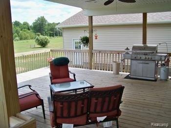 205 Nugent Road Bad Axe, MI 48413 - Photo 5 of 8 Large rear deck.jpg