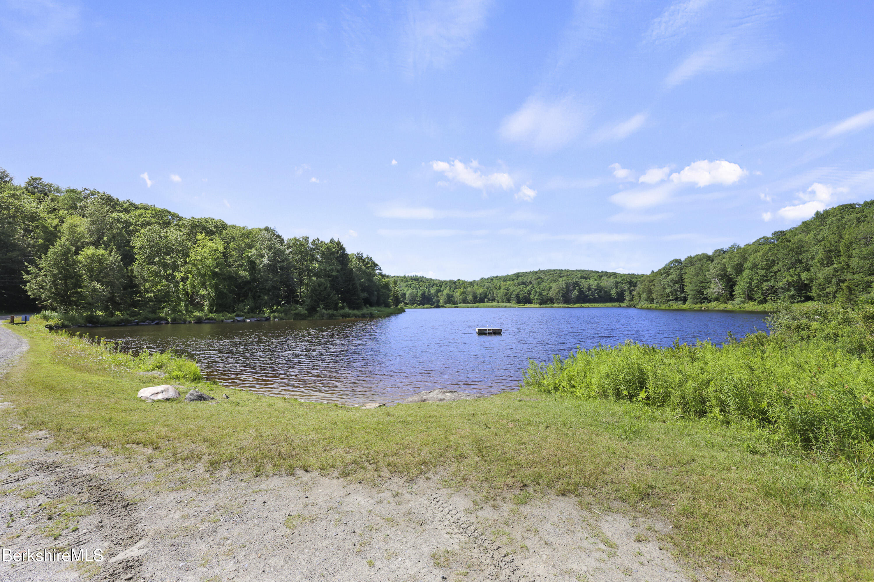 34-36 Lake View Road Hinsdale, MA 01235 - Photo 8 of 11 a view of yard with swimming pool and green space