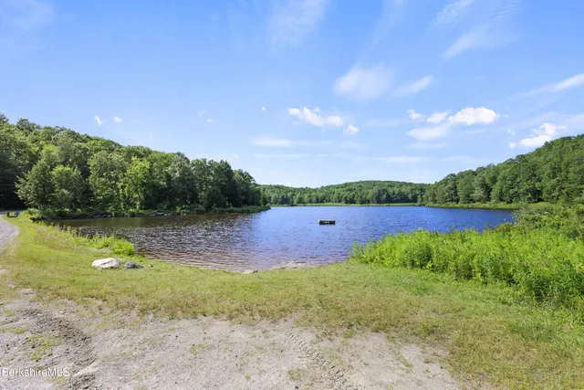 a street sign on a pole on a street