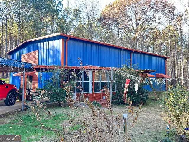a view of a street with sitting area