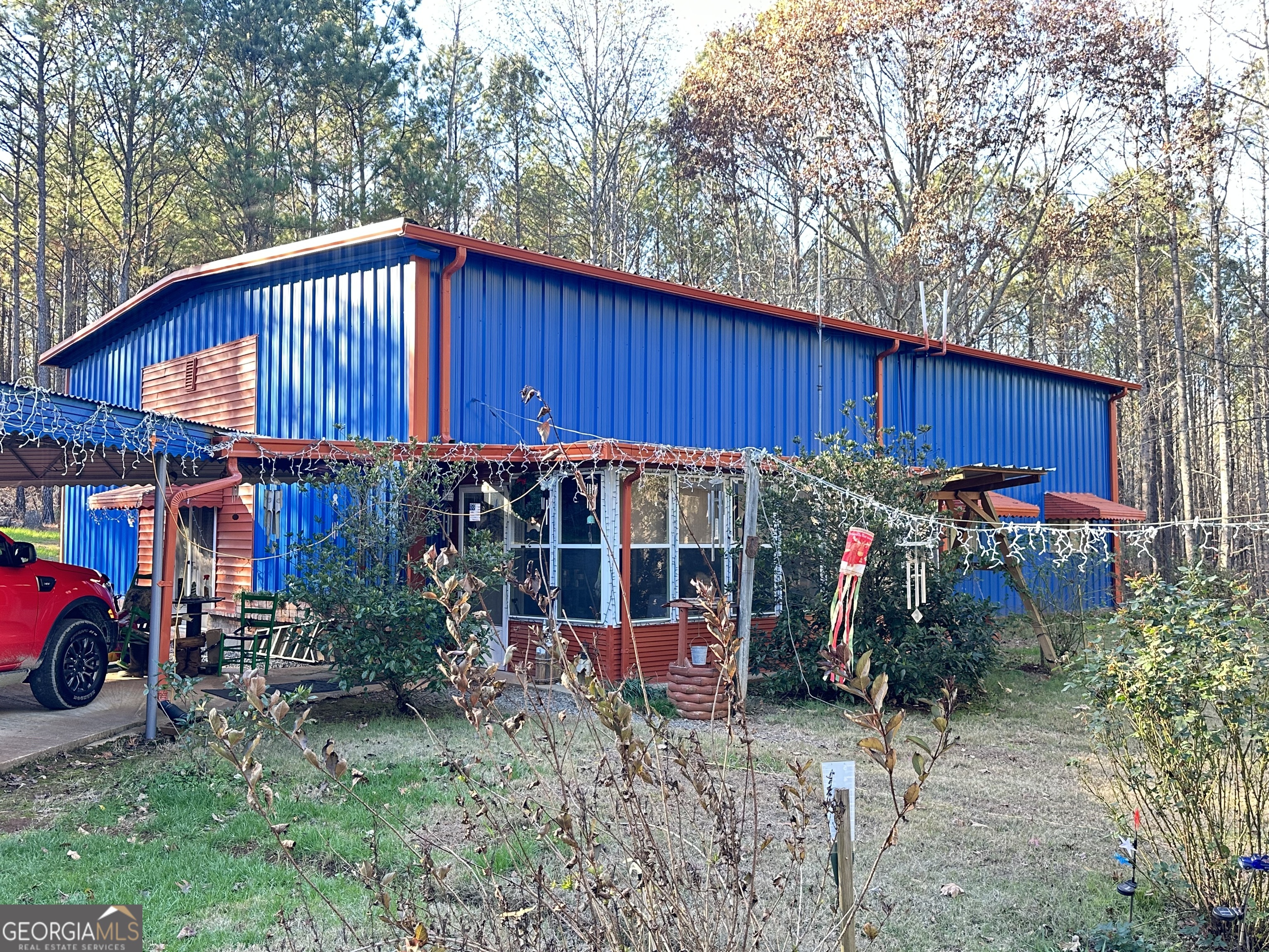 a view of a street with sitting area