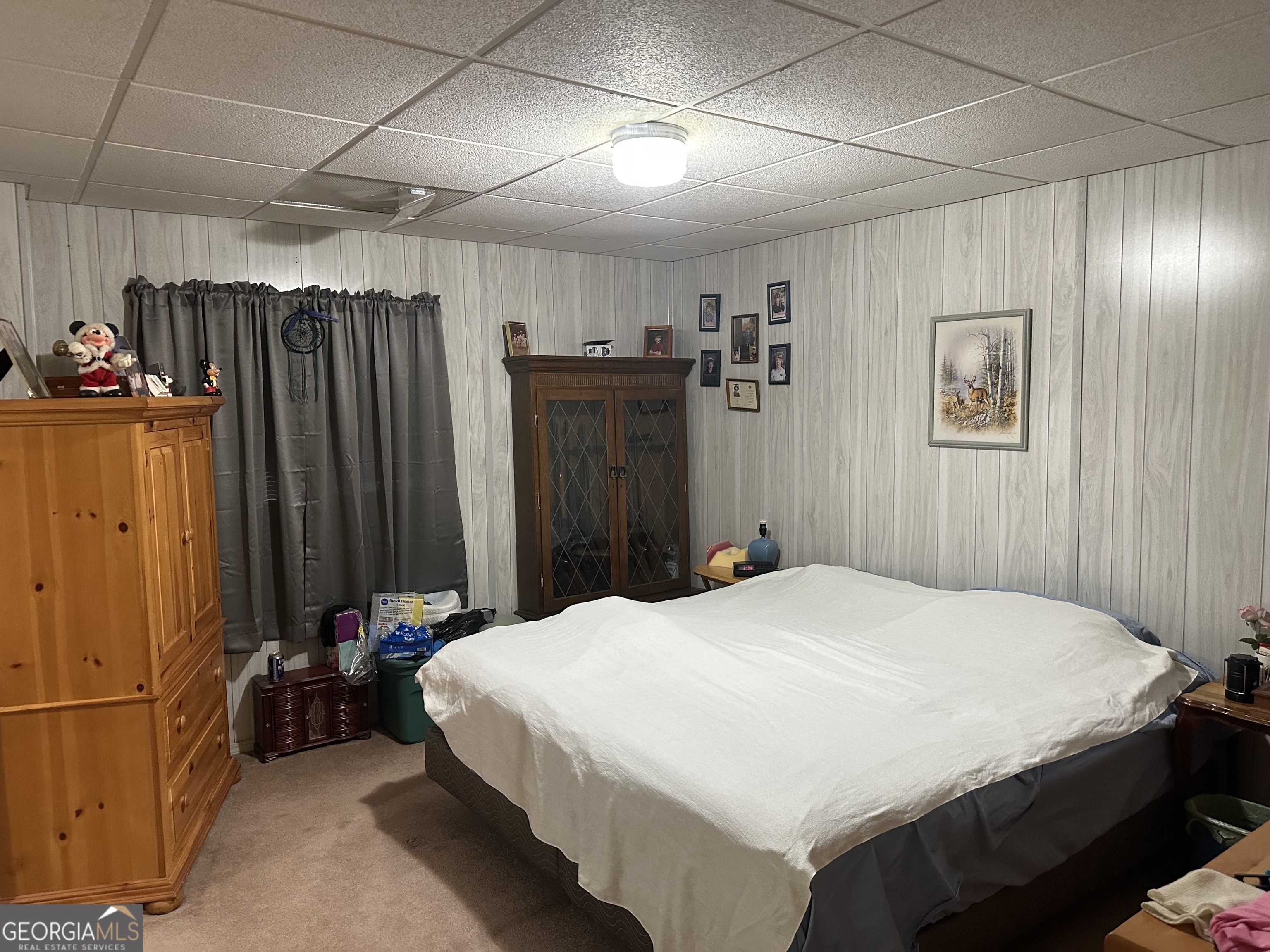 202 Taylor Road Talbotton, GA 31827 - Photo 9 of 32 a bedroom with a bed and a furniture