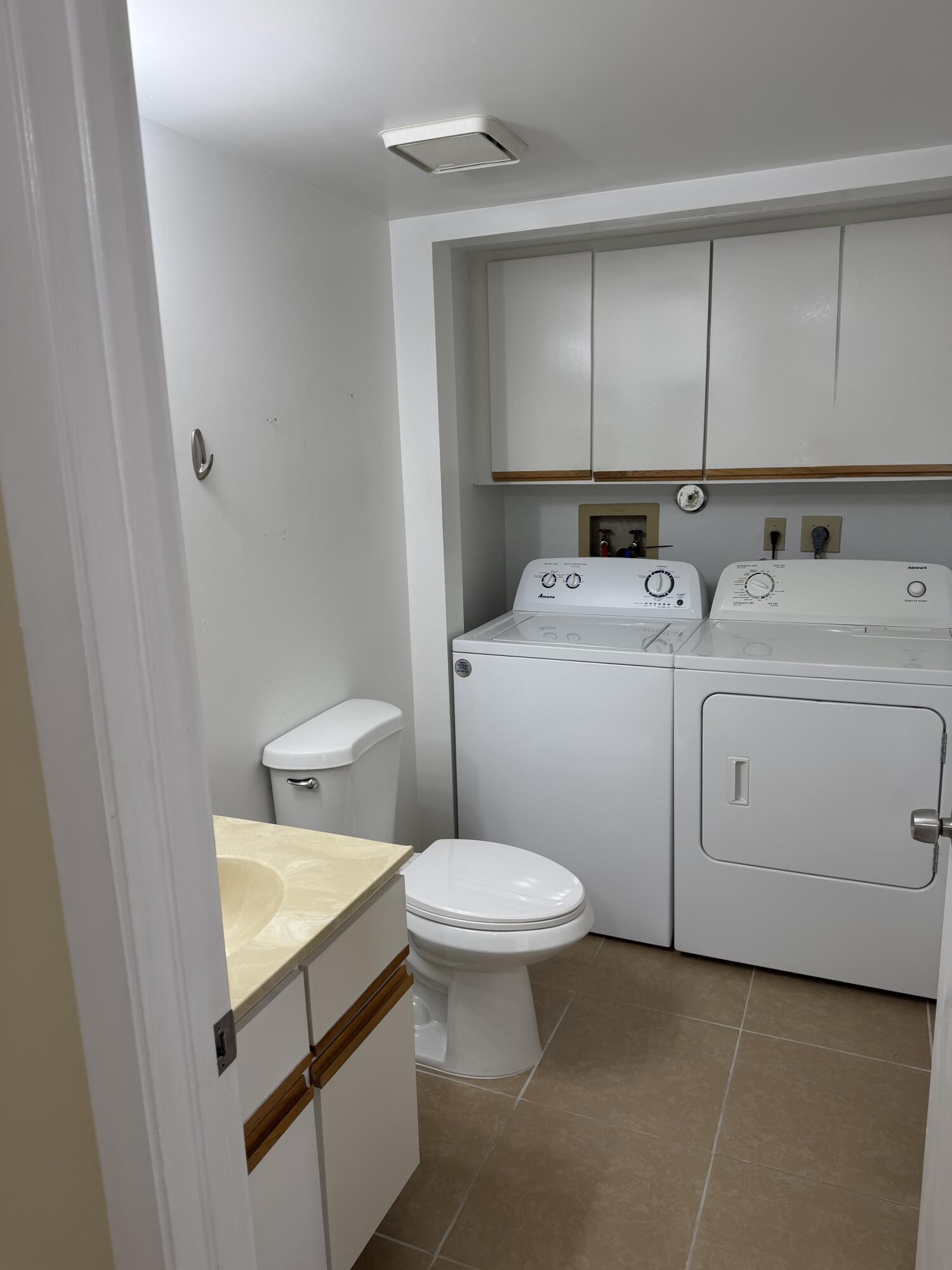 8461 Boca Rio Drive Boca Raton, FL 33433 - Photo 10 of 27 HALF BATH W/ WASHER/DRYER