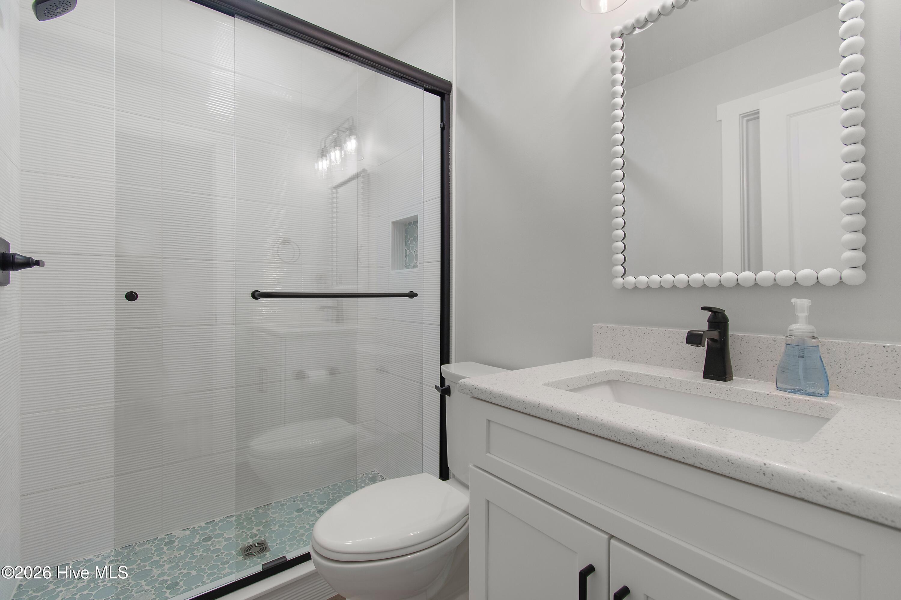 1707 East Main Street Sunset Beach, NC 28468 - Photo 17 of 44 Main Level Hall Bath