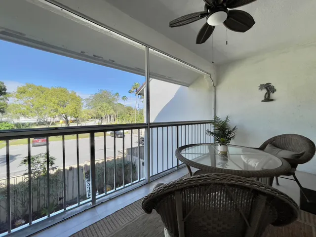 a view of a balcony dining area