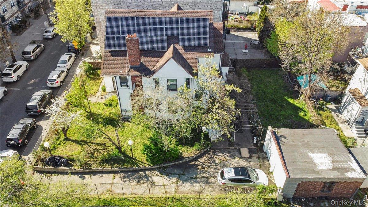1428 Doris Street Bronx, NY 10462 - Photo 12 of 26 an aerial view of a house with swimming pool