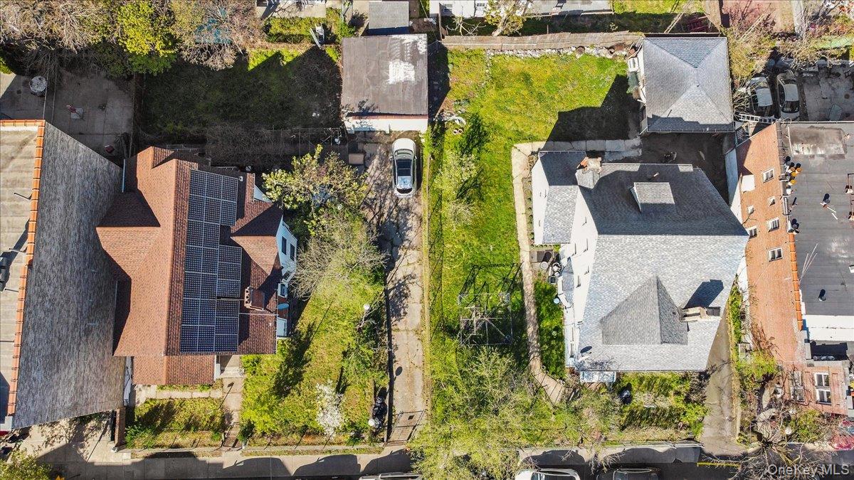 1428 Doris Street Bronx, NY 10462 - Photo 17 of 26 an aerial view of residential houses with outdoor space