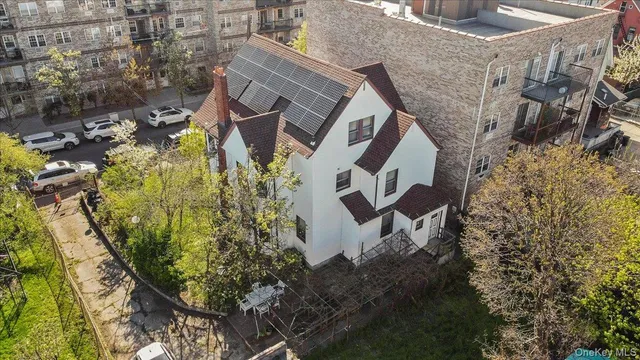 an aerial view of a house with garden