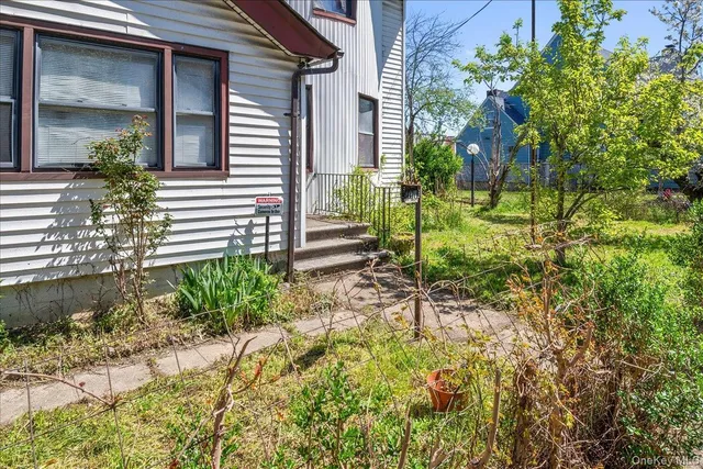 a view of house with outdoor space
