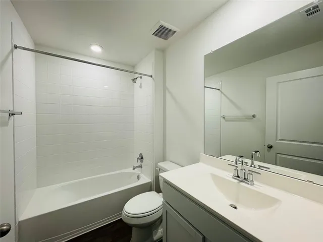 an empty room with a empty space and window