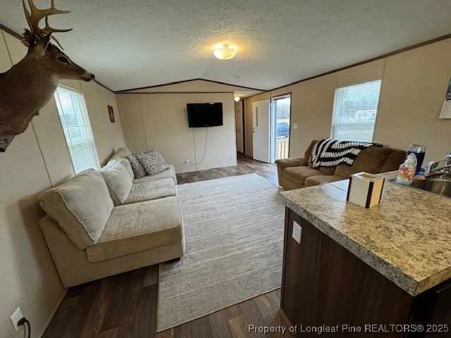 176 Fire Tower Road Orrum, NC 28369 - Photo 4 of 14 a living room with furniture and a flat screen tv