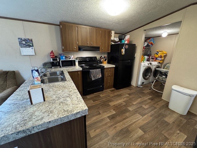 176 Fire Tower Road Orrum, NC 28369 - Photo 5 of 14 a kitchen with a refrigerator stove and sink
