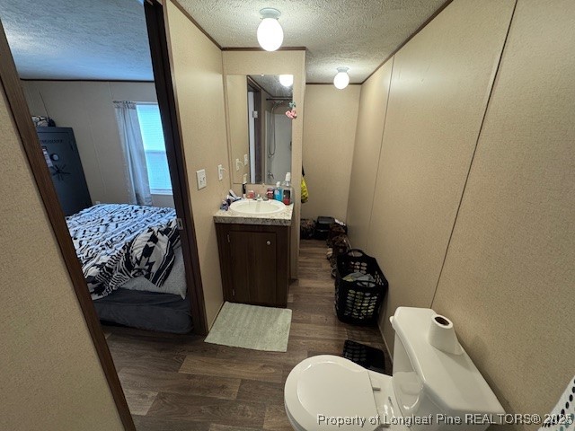 176 Fire Tower Road Orrum, NC 28369 - Photo 9 of 14 a bathroom with a toilet a sink and mirror