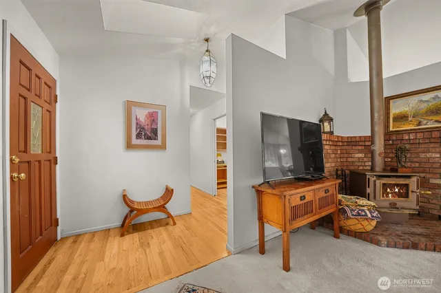 a living room with furniture wall and a flat screen tv