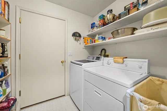 a utility room with dryer and washer
