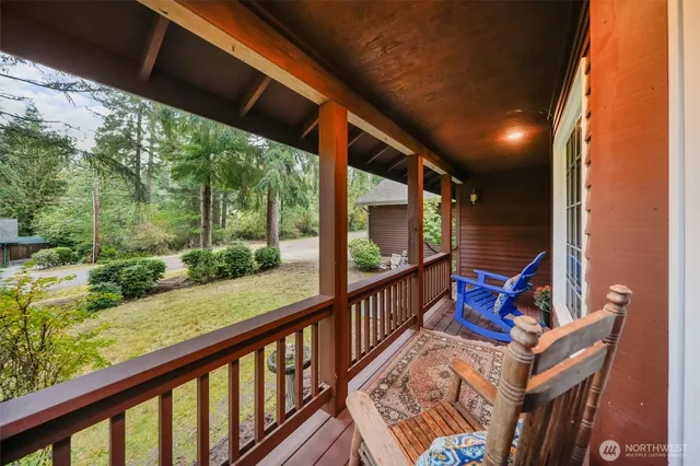 a view of balcony with furniture