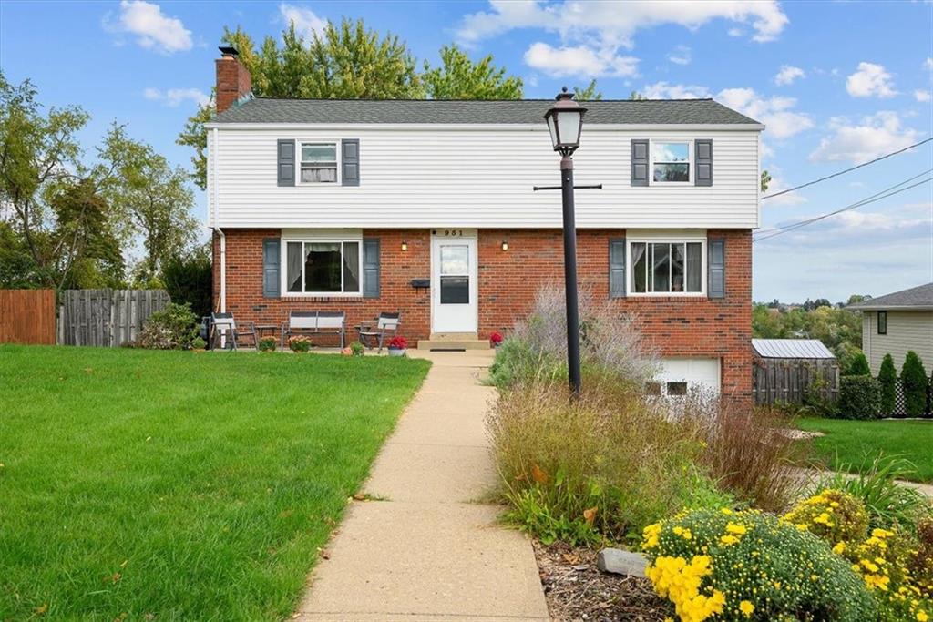 951 Highview Road Pittsburgh, PA 15234 - Photo 1 of 25 a front view of a house with garden