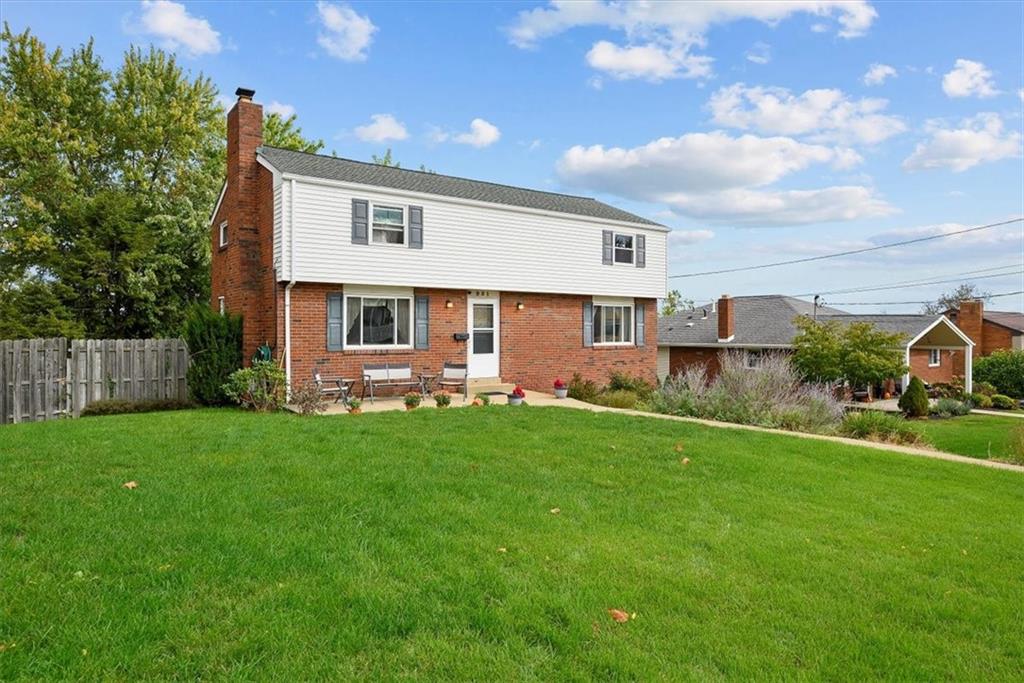 951 Highview Road Pittsburgh, PA 15234 - Photo 25 of 25 a view of a backyard with plants and a garden