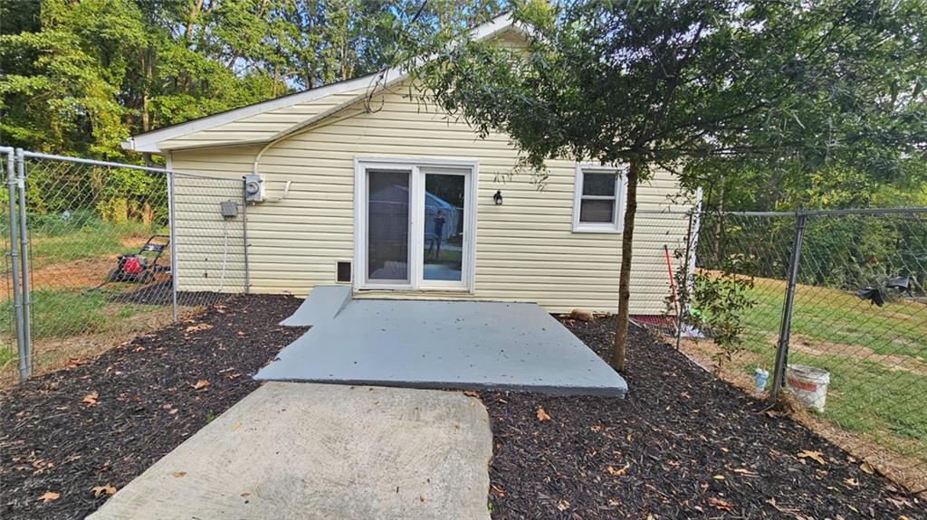 471 Perkins Circle Canton, GA 30115 - Photo 8 of 20 a front view of a house with a yard