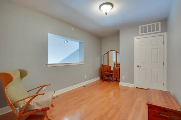 a room with furniture and a window