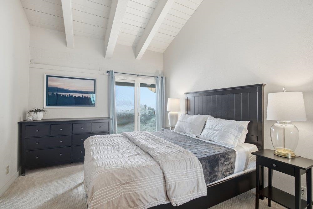 2090 Chalet Road, Unit 16 Alpine Meadows, CA 96146 - Photo 12 of 20 a bedroom with a bed and a lamp on dresser