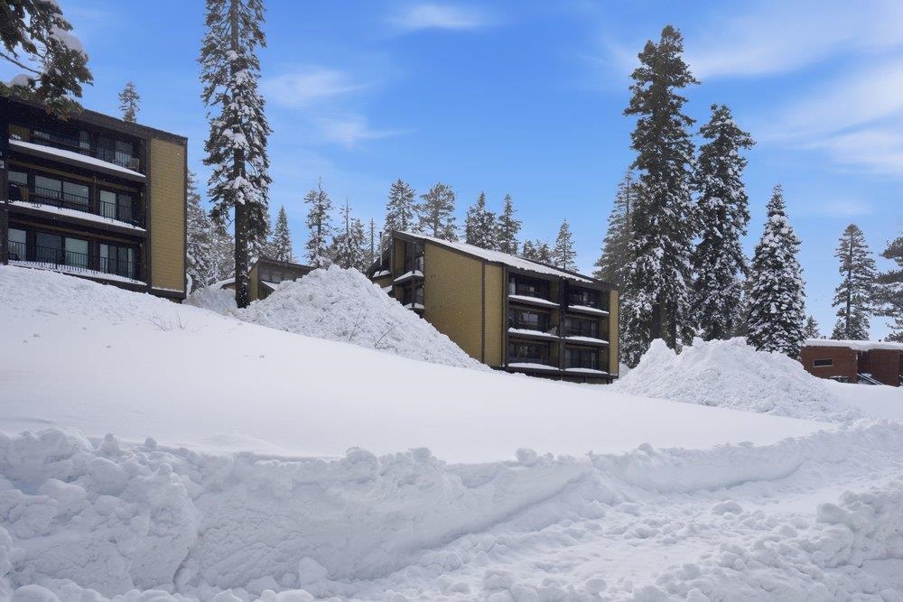 2090 Chalet Road, Unit 16 Alpine Meadows, CA 96146 - Photo 18 of 20 a view of a house with a snow in the yard