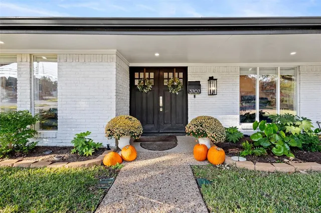 a front view of a house with patio