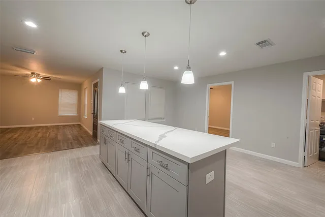 a bathroom with a sink a vanity and a mirror