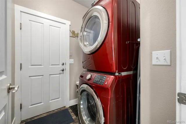 a view of a porch with furniture and garden