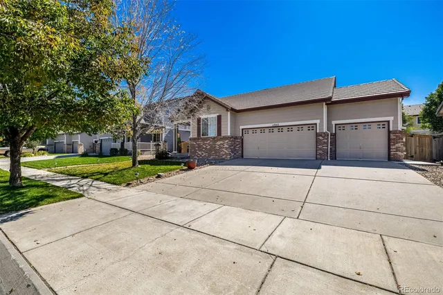 a house view with a garage