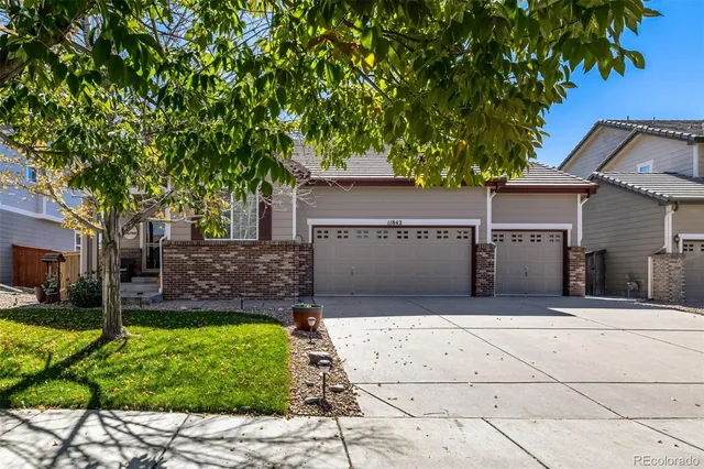 a view of a backyard with a garden