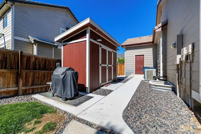 a picture of door with an open kitchen
