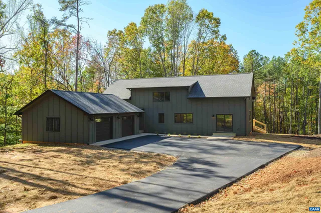 a house with trees in front of it