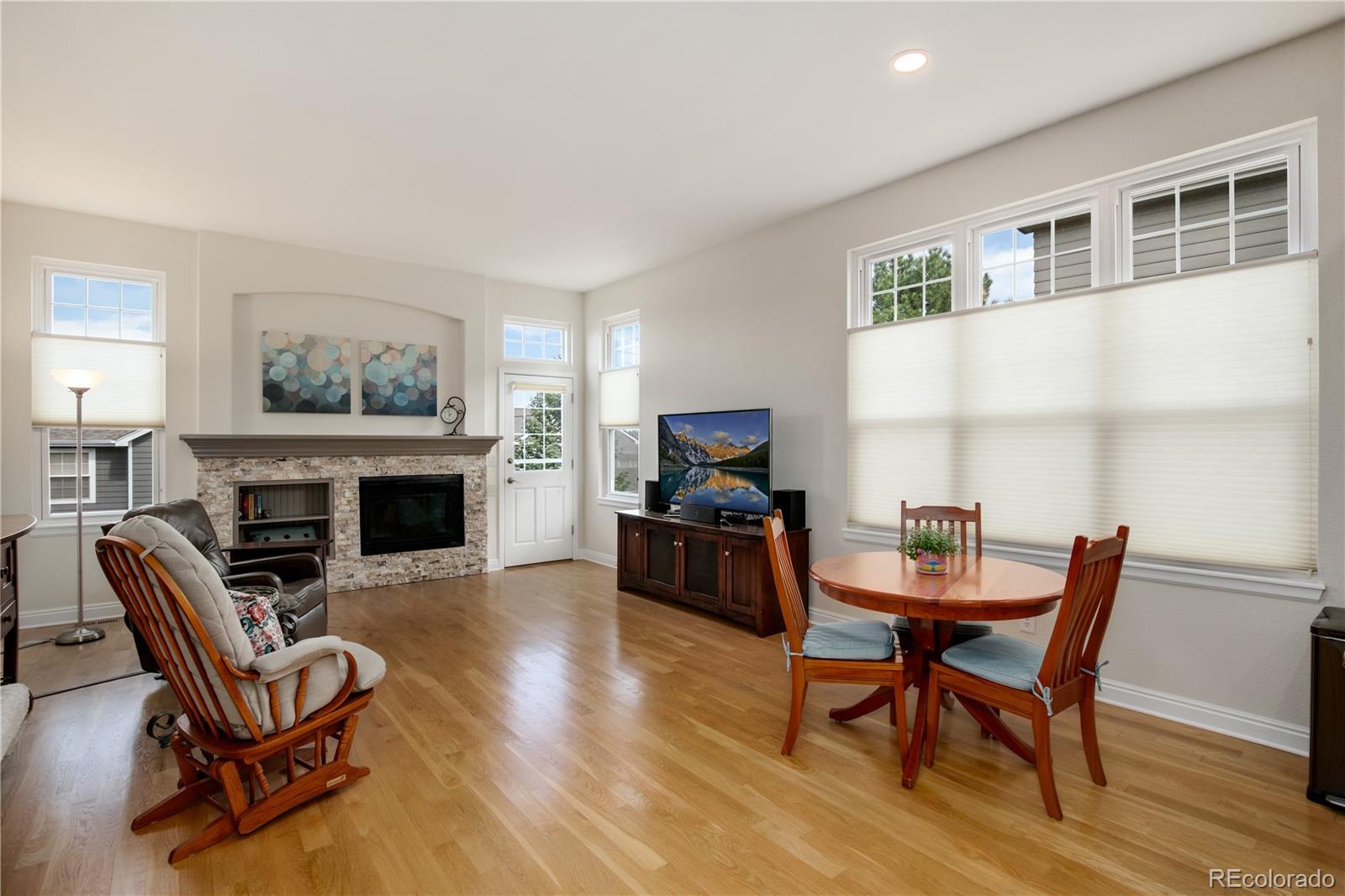 3946 Mallard Street Highlands Ranch, CO 80126 - Photo 13 of 40 a view of a livingroom with furniture and a fireplace