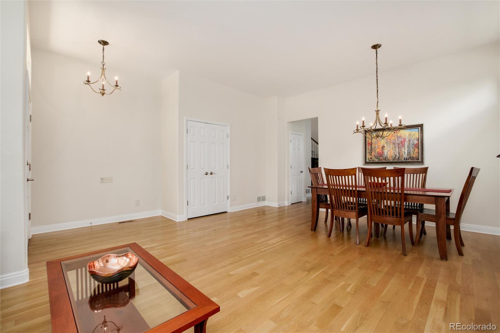 3946 Mallard Street Highlands Ranch, CO 80126 - Photo 5 of 40 a view of a dining room with furniture