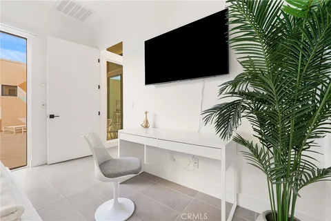 a bathroom with a sink mirror and a shower