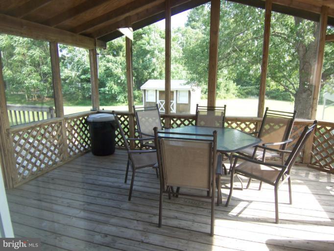 49419 Portneys Overlook Road Ridge, MD 20680 - Photo 4 of 21 screened porch