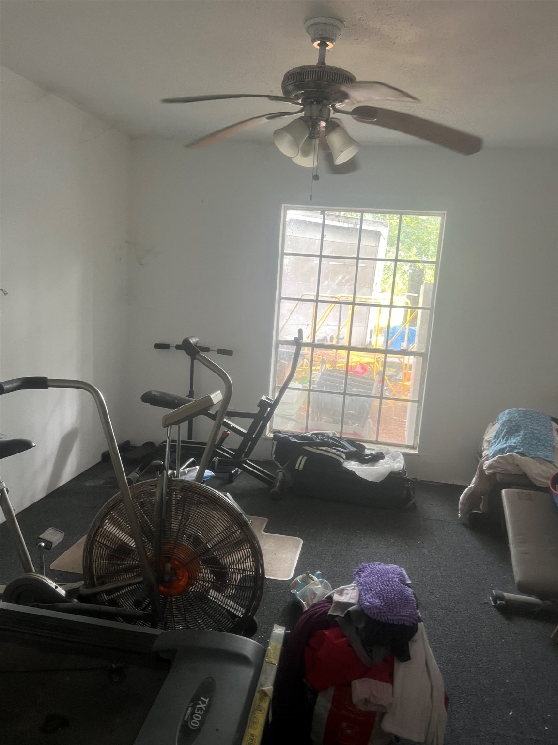 16707 Waycreek Road Houston, TX 77068 - Photo 23 of 29 a view of a room with gym equipment