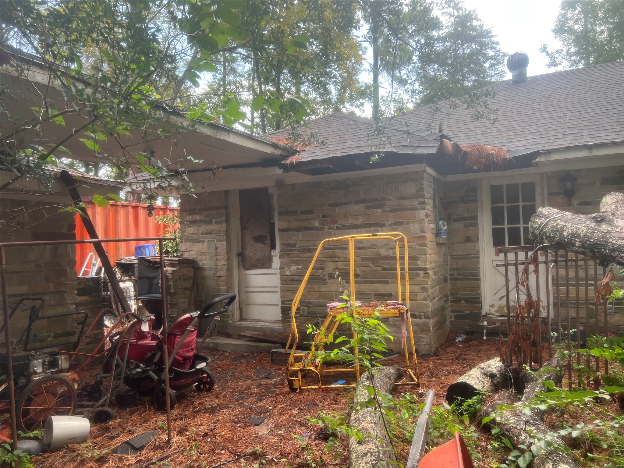 16707 Waycreek Road Houston, TX 77068 - Photo 25 of 29 a view of a chair and table in backyard of the house