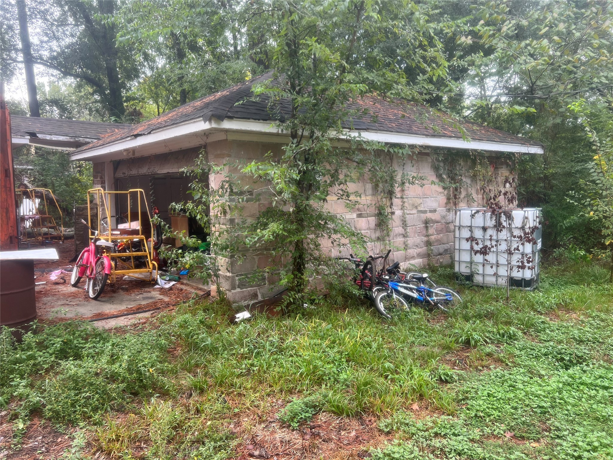 16707 Waycreek Road Houston, TX 77068 - Photo 27 of 29 a view of a chair and table in backyard of the house