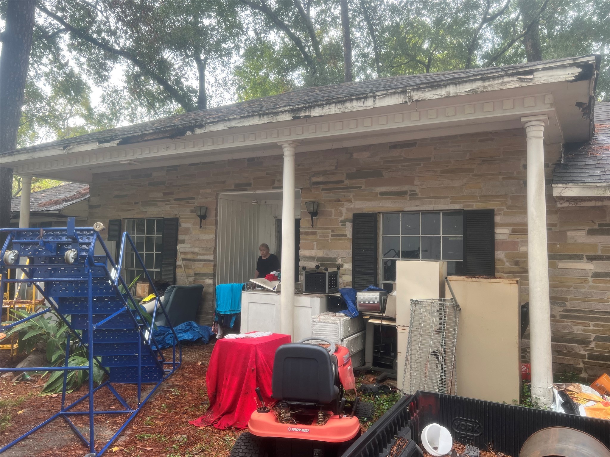 16707 Waycreek Road Houston, TX 77068 - Photo 3 of 29 a view of a patio with table and chairs and potted plants