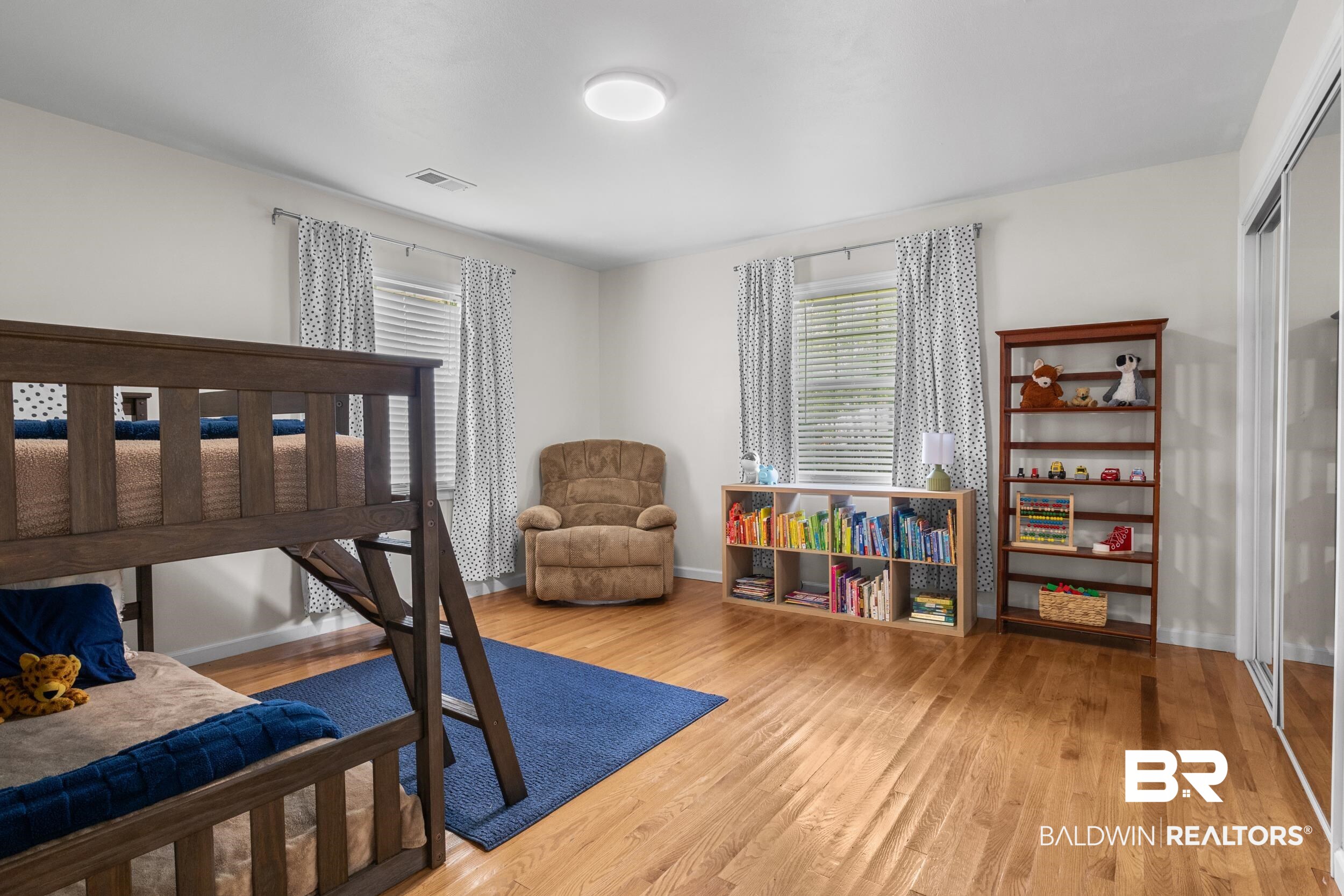 17689 Brewer Road Foley, AL 36535 - Photo 21 of 54 Bedroom featuring light wood-type flooring and a closet