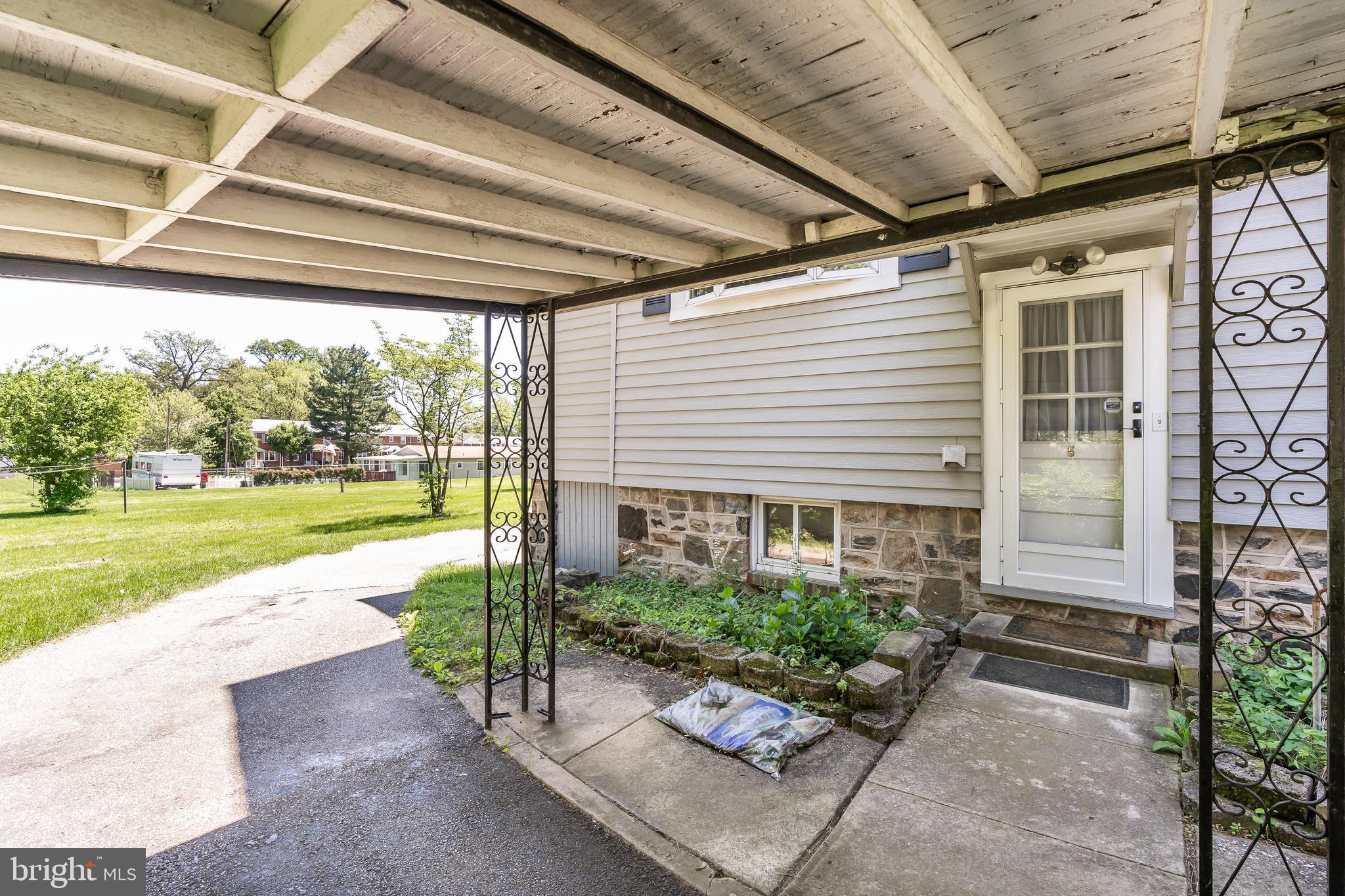 137 Cherrydell Road Baltimore, MD 21228 - Photo 43 of 44 Covered carport and side entrance