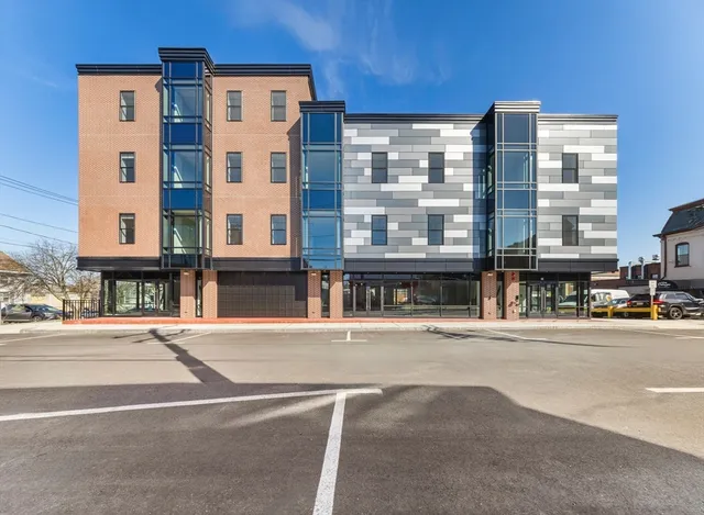 a front view of a building with street