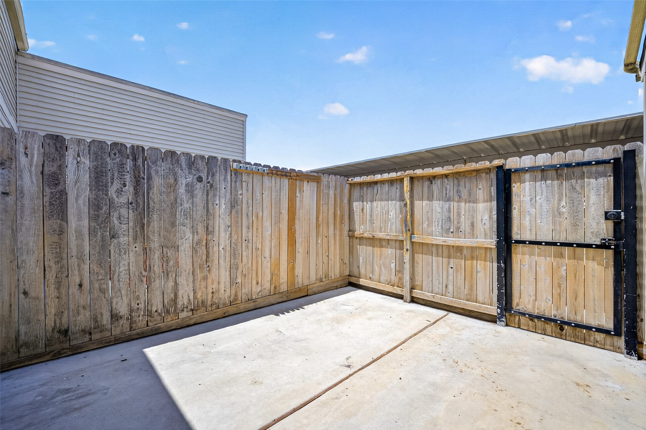 6401 Deihl Road, Unit 902 Houston, TX 77092 - Photo 24 of 35 Step from the bedroom to your private back patio, perfect for morning coffee or evening relaxation.