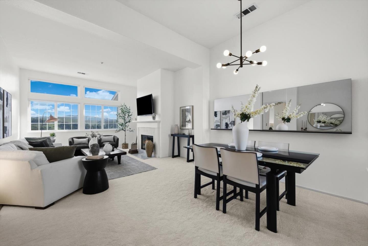 129 Outlook Circle Pacifica, CA 94044 - Photo 12 of 52 a living room with furniture a flat screen tv and a large window