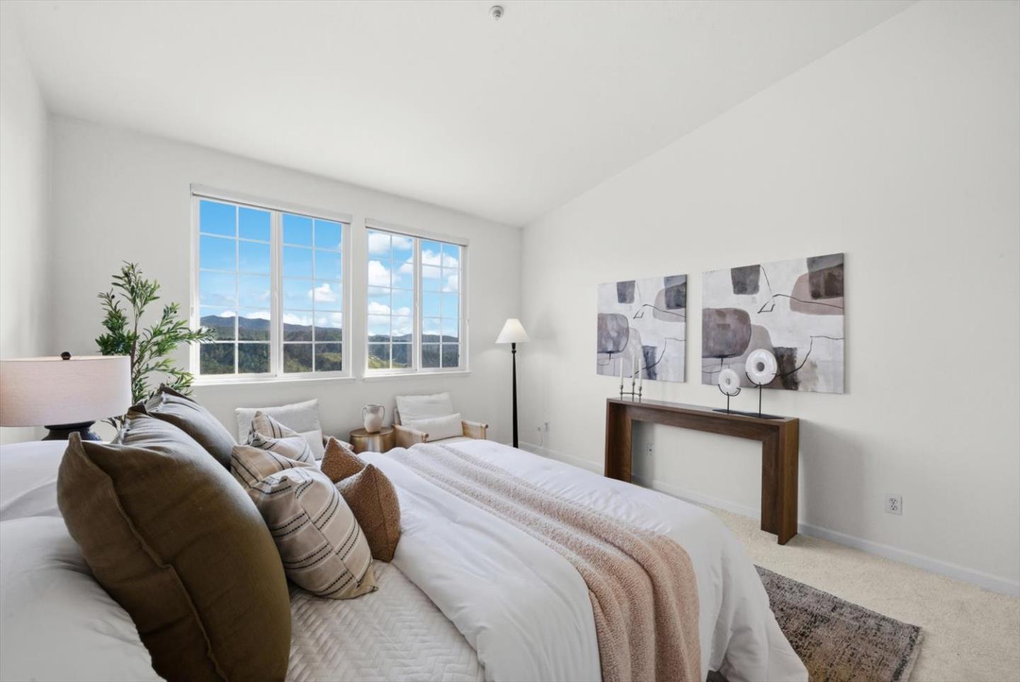 129 Outlook Circle Pacifica, CA 94044 - Photo 22 of 52 a bedroom with a large bed and a window