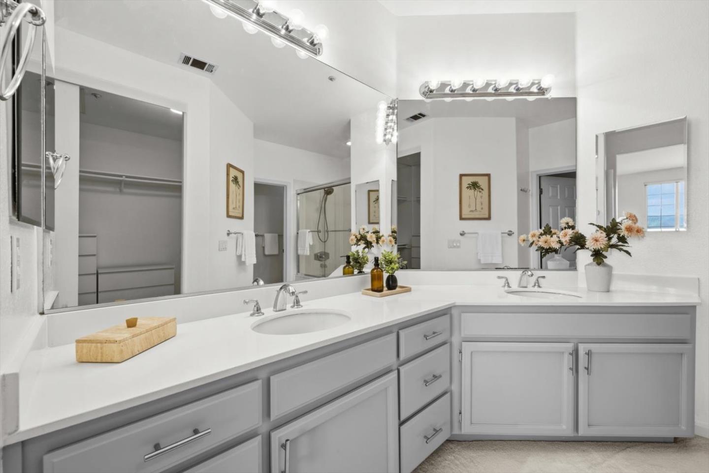 129 Outlook Circle Pacifica, CA 94044 - Photo 25 of 52 a bathroom with double sink and a mirror